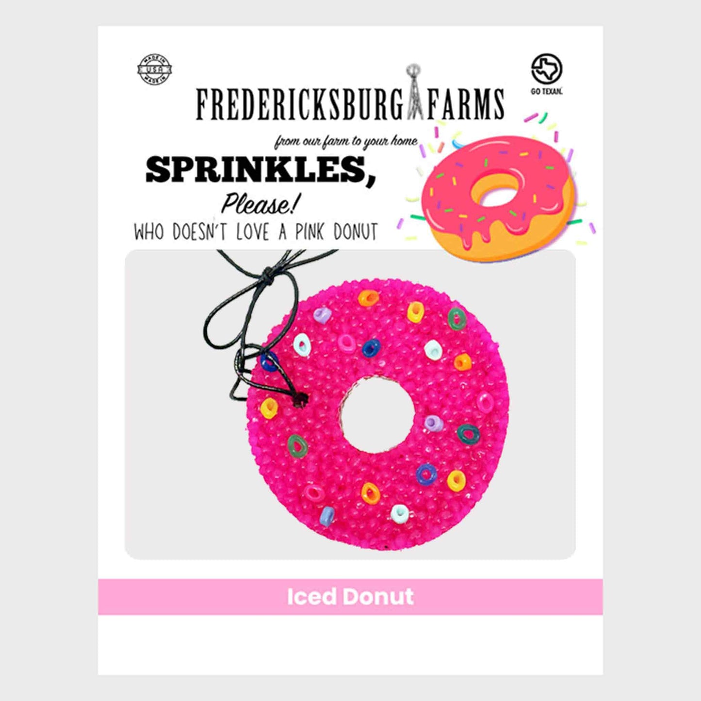 Pink donut-shaped product with colorful sprinkles on a white background, branded as Fredericksburg Farms.